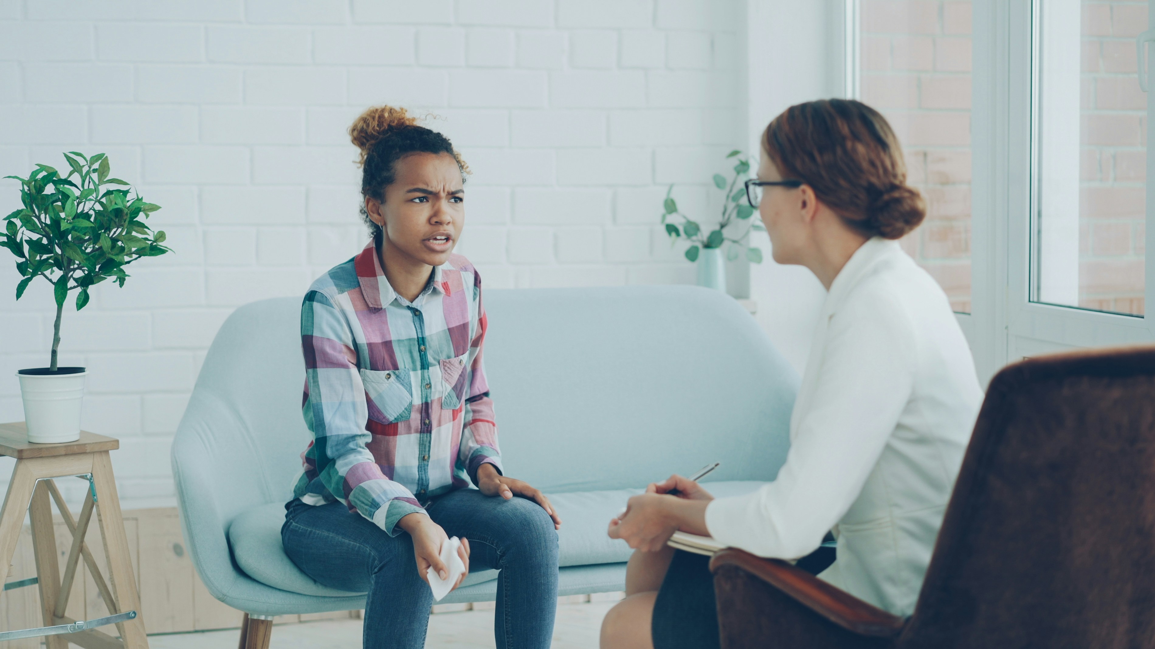 People working through a conversation together